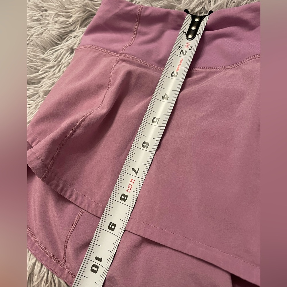 Lulu lemon shorts. Rose colored. Great condition. Size 8.